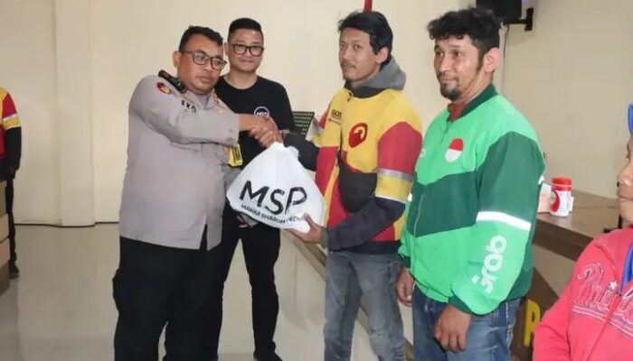 Sambut Natal, MSP Komunitas Gereja Bersama Polres Tanah Karo Salurkan Bantuan Sembako